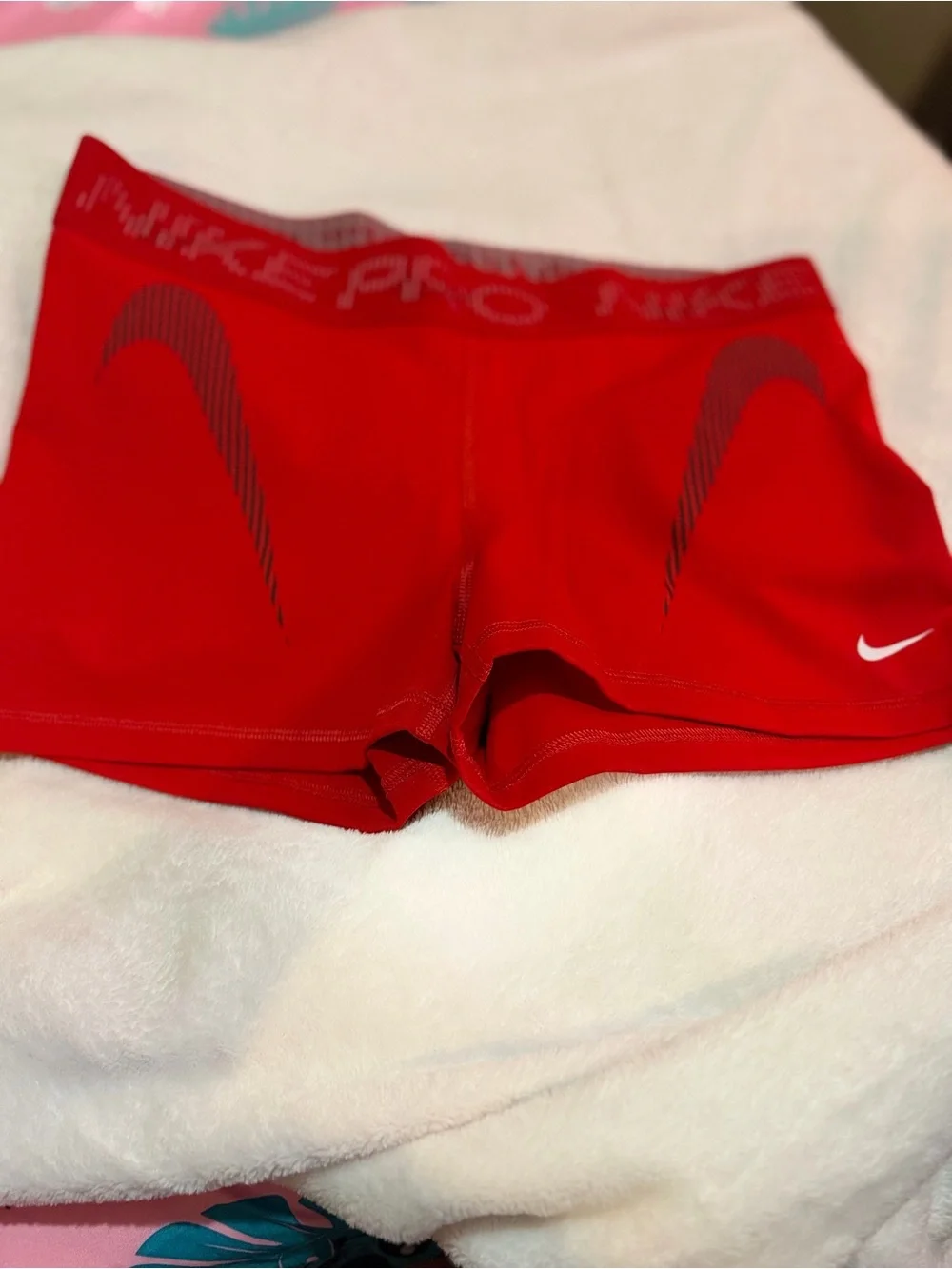 Nike Women’s Red Pro Bike Shorts with Subtle Branding
